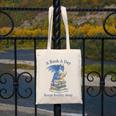A Book A Day Keeps Reality Away Premium Tri-Blend Canvas Tote Bag A Book A Day Keeps Reality Away Premium Tri-Blend Canvas Tote Bag