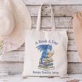 A Book A Day Keeps Reality Away Premium Tri-Blend Canvas Tote Bag A Book A Day Keeps Reality Away Premium Tri-Blend Canvas Tote Bag