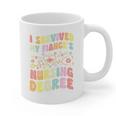 i Survived My Fiance's Nursing Degree Graduation Groovy Premium Graphic Print Coffee Mug