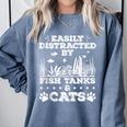 Easily Distracted By Fish Tanks And Cats Lover Introvert Comfort Colors Sweatshirt Blue Jean Easily Distracted By Fish Tanks And Cats Lover Introvert Comfort Colors Sweatshirt Blue Jean