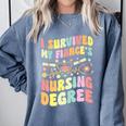 i Survived My Fiance's Nursing Degree Graduation Groovy Premium Comfort Colors Sweatshirt Blue Jean