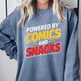 Powered By Comics And Snacks Comic Book Lover Comfort Colors Sweatshirt Denim