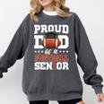 Proud Dad Of a Football Senior 2026 Graduation Comfort Colors Sweatshirt Pepper