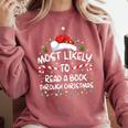 Most Likely To Read A Book Through Christmas Xmas Comfort Colors Sweatshirt Orchid