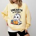 Unearth a Story Cute Dinosaur Summer Reading 2026 Dino Book Comfort Colors Sweatshirt Blue Spruce