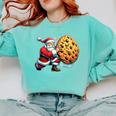 Santa Holding Cookie Xmas Baker Introvert Christmas Comfort Colors Sweatshirt Chalky Mint