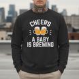 New Dad Baby Shower Cheers A Baby Is Brewing Men Sweatshirt New Dad Baby Shower Cheers A Baby Is Brewing Men Sweatshirt