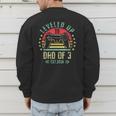 I Leveled Up To Dad Of 3 2026 Promoted To Dad Of Three Kids Men's Sweatshirt Back Print