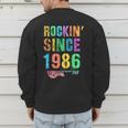 Rockin' Since 1986 Vintage Rockstar 40th Birthday Mom Dad 40 Men's Sweatshirt Back Print