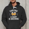 New Dad Baby Shower Cheers A Baby Is Brewing Men Hoodie New Dad Baby Shower Cheers A Baby Is Brewing Men Hoodie