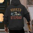 Hooked On Being Stepdad Father's Day Fishing Stepdad Men's Hoodie Back Print