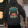 I Leveled Up To Dad Of 2 2026 Promoted To Dad Of Two Kids Men's Hoodie Back Print