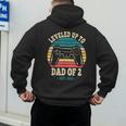 I Leveled Up To Dad Of 2 2026 Promoted To Dad Of Two Kids Men's Hoodie Back Print