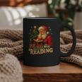 He Sees What You’Ve Been Reading Santa Book Lover Christmas Graphic Print Coffee Mug He Sees What You’Ve Been Reading Santa Book Lover Christmas Graphic Print Coffee Mug