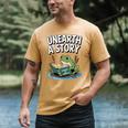 Unearth a Story Frog Reading a Book Summer 2026 Men's Comfort Colors T-Shirt Mustard Unearth a Story Frog Reading a Book Summer 2026 Men's Comfort Colors T-Shirt Mustard