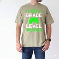 Kids 1st Grade Level Unlocked Back To School Gamer Graduation Men's Comfort Colors T-Shirt Khaki