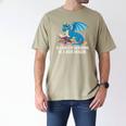 In A World Full Of Bookworms Be A Book Dragon Men's Comfort Colors T-Shirt Khaki In A World Full Of Bookworms Be A Book Dragon Men's Comfort Colors T-Shirt Khaki