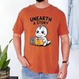 Unearth a Story Cute Dinosaur Summer Reading 2026 Dino Book Men's Comfort Colors T-Shirt Yam Unearth a Story Cute Dinosaur Summer Reading 2026 Dino Book Men's Comfort Colors T-Shirt Yam