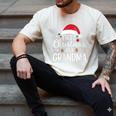 First Christmas As A Grandma Holiday New Grandmother Memory Men's Comfort Colors T-Shirt Ivory First Christmas As A Grandma Holiday New Grandmother Memory Men's Comfort Colors T-Shirt Ivory