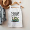Unearth a Story Frog Reading a Book Summer 2026 Premium Tri-Blend Men Tank Top
