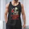 Staying Alive One Book At A Time Skeleton Reading Librarian Men Tank Top Staying Alive One Book At A Time Skeleton Reading Librarian Men Tank Top