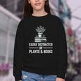 Easily Distracted By Plants & Books Plant Book Lover Youth Crewneck Sweatshirt Easily Distracted By Plants & Books Plant Book Lover Youth Crewneck Sweatshirt