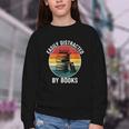 Women's Easily Distracted By Books Youth Crewneck Sweatshirt Women's Easily Distracted By Books Youth Crewneck Sweatshirt