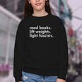 Women's Read Books Lift Weights Fight Fascists Reading Activism Meme Youth Crewneck Sweatshirt Women's Read Books Lift Weights Fight Fascists Reading Activism Meme Youth Crewneck Sweatshirt