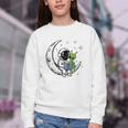 Astronaut Reading Book To Alien Moon Space Astronomy Youth Crewneck Sweatshirt