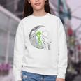 Astronaut Reading Book To Alien Moon Space Women Kids Men Premium Tri-Blend Youth Crewneck Sweatshirt