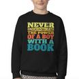 Retro Never Underestimate The Power Of a Boy With a Book Youth Crewneck Sweatshirt