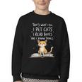 That's What I Do I Pet Cats I Read Books And I Know Things Youth Crewneck Sweatshirt