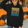 Retro Never Underestimate The Power Of a Boy With a Book Graphic Youth Hoodie