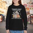Chasing That Scholastic Book Fair Feeling Apparel Youth Long Sleeve Tee