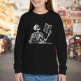 Hilarious Skeleton Holding a Book And Laughing Gothic Youth Long Sleeve Tee Hilarious Skeleton Holding a Book And Laughing Gothic Youth Long Sleeve Tee
