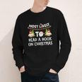 Most Likely To Read A Book On Christmas Snowman Family Youth Long Sleeve Tee