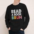 Read A Book Bruh Teacher Youth Long Sleeve Tee