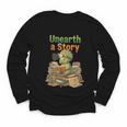 Unearth a Story Triceratops Dinosaur Reading Books Cute Dino Youth Long Sleeve Tee Unearth a Story Triceratops Dinosaur Reading Books Cute Dino Youth Long Sleeve Tee